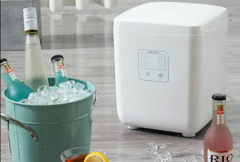 Countertop ice maker producing ice cubes for chilled drinks