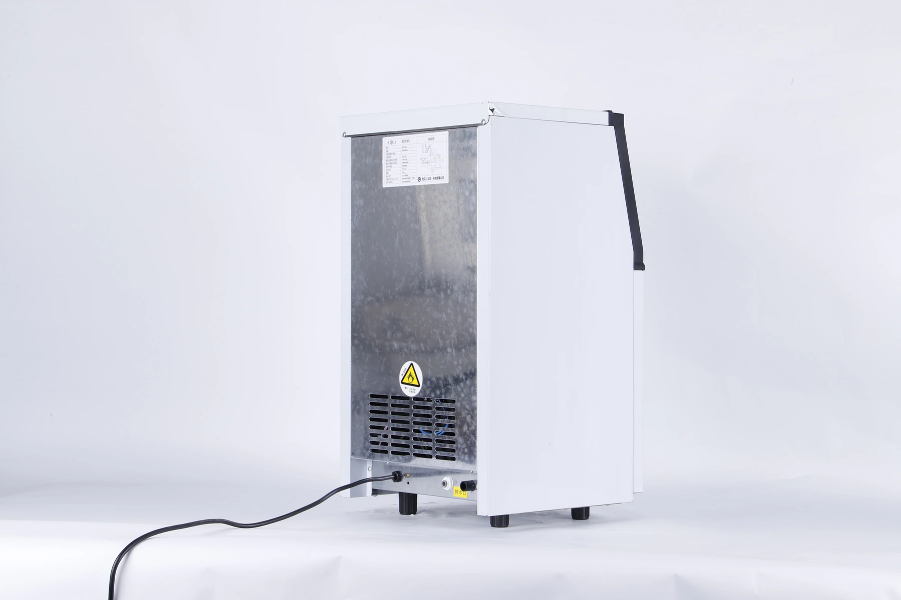 Rear view of a KT-36 commercial ice machine showing ventilation and connection areas